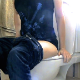 A slender British girl pisses and takes a shit while sitting on a toilet. A heavy plop and some smaller followup plops are heard. About 3.5 minutes.